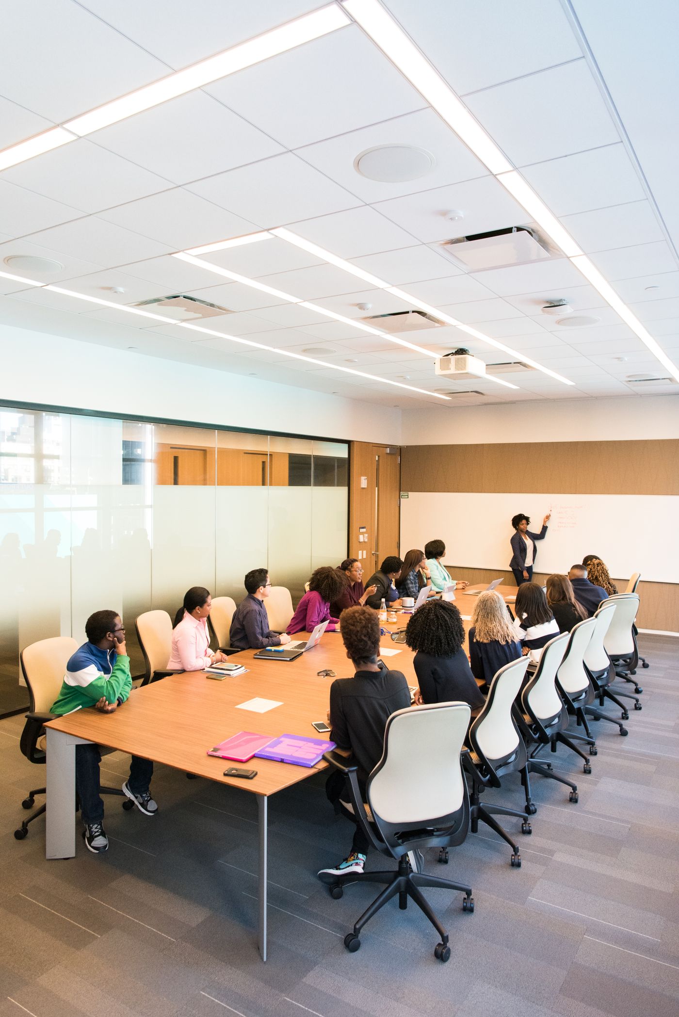 Illustrative photograph: Professionals collaborating in a strategy meeting